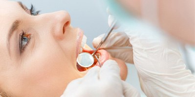 female patient during dental exam  