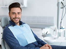 Doctor holding clipboard during patient consultation