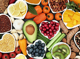 Colorful selection of healthy foods sitting on table