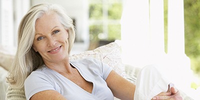 woman smiling with dental implants