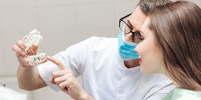 Carmichael implant dentist explaining dental implants