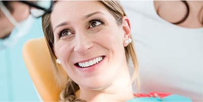 Smiling woman in dental chair