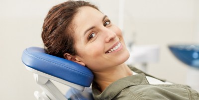 Woman smiling in dental chair