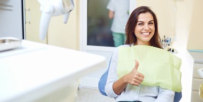 Woman smiling in dental chair