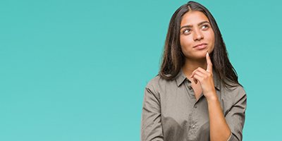 Portrait of curious woman who has questions about sedation dentistry