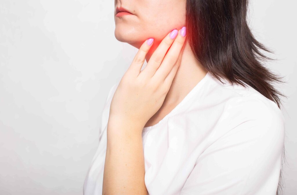 Woman with pain in her salivary gland