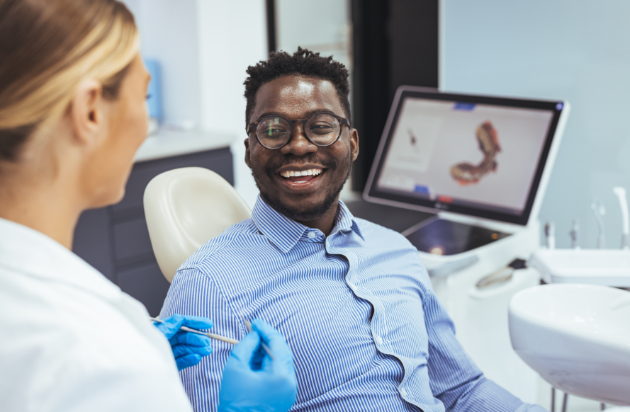 Patient smiling at dentist